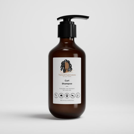 Brown shampoo bottle with curly shampoo label on a light gray background